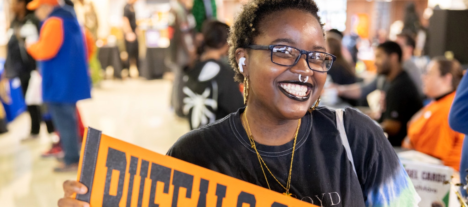 Student with a banner